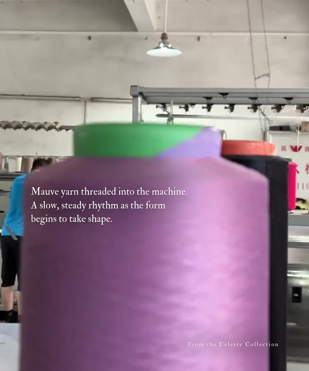 hello ronron | Mauve yarn spool on a factory floor background