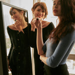 hello ronron | Sylvie Dress Black | Button-embellished off-shoulder ribbed knit midi dress
